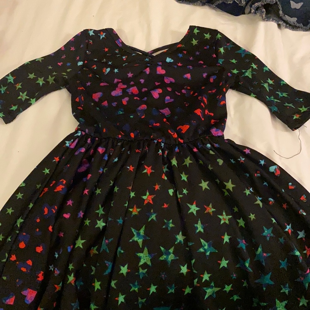 Black with multi colored stars